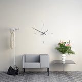 Tacón Wall Clock