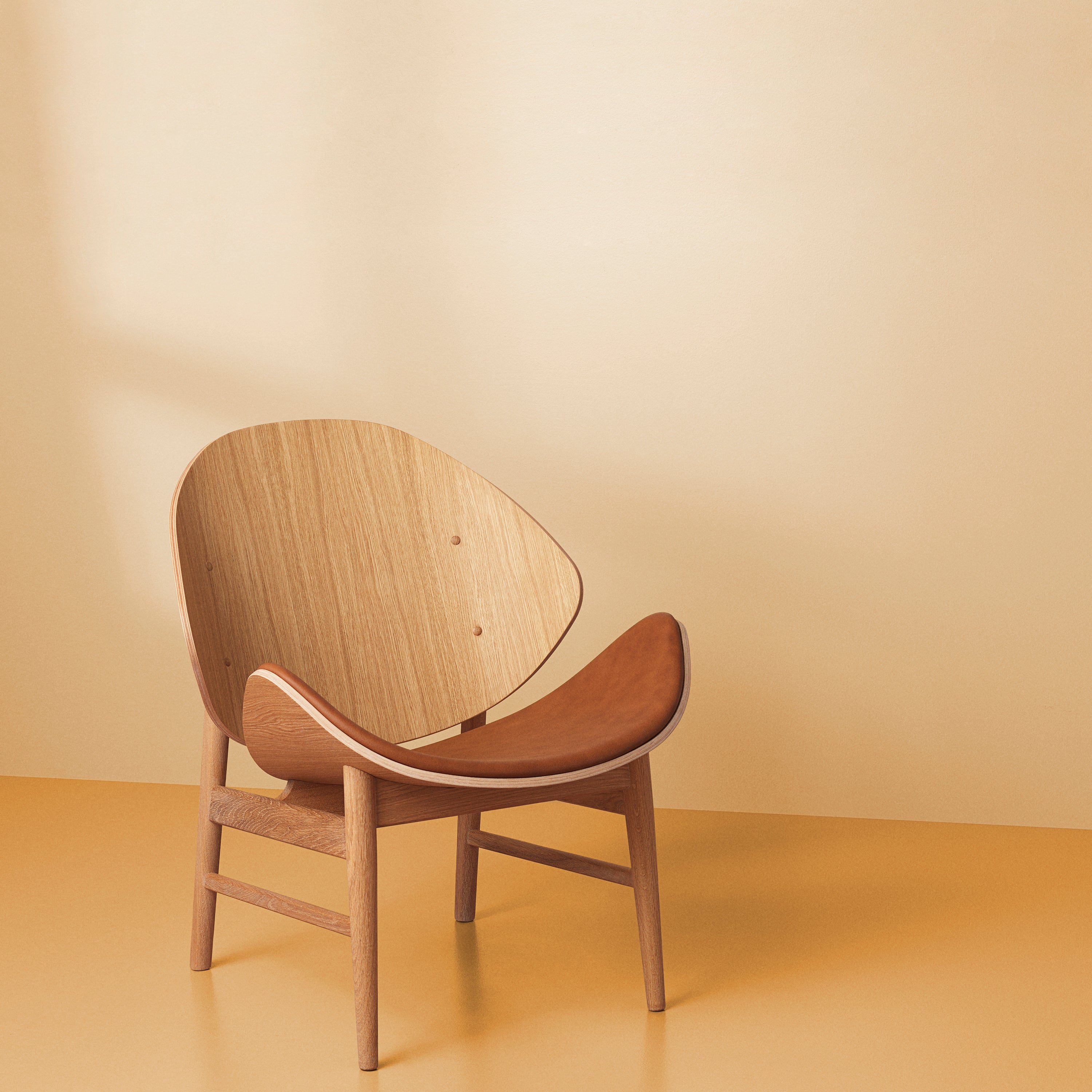 The Orange Lounge Chair: Seat Upholstered