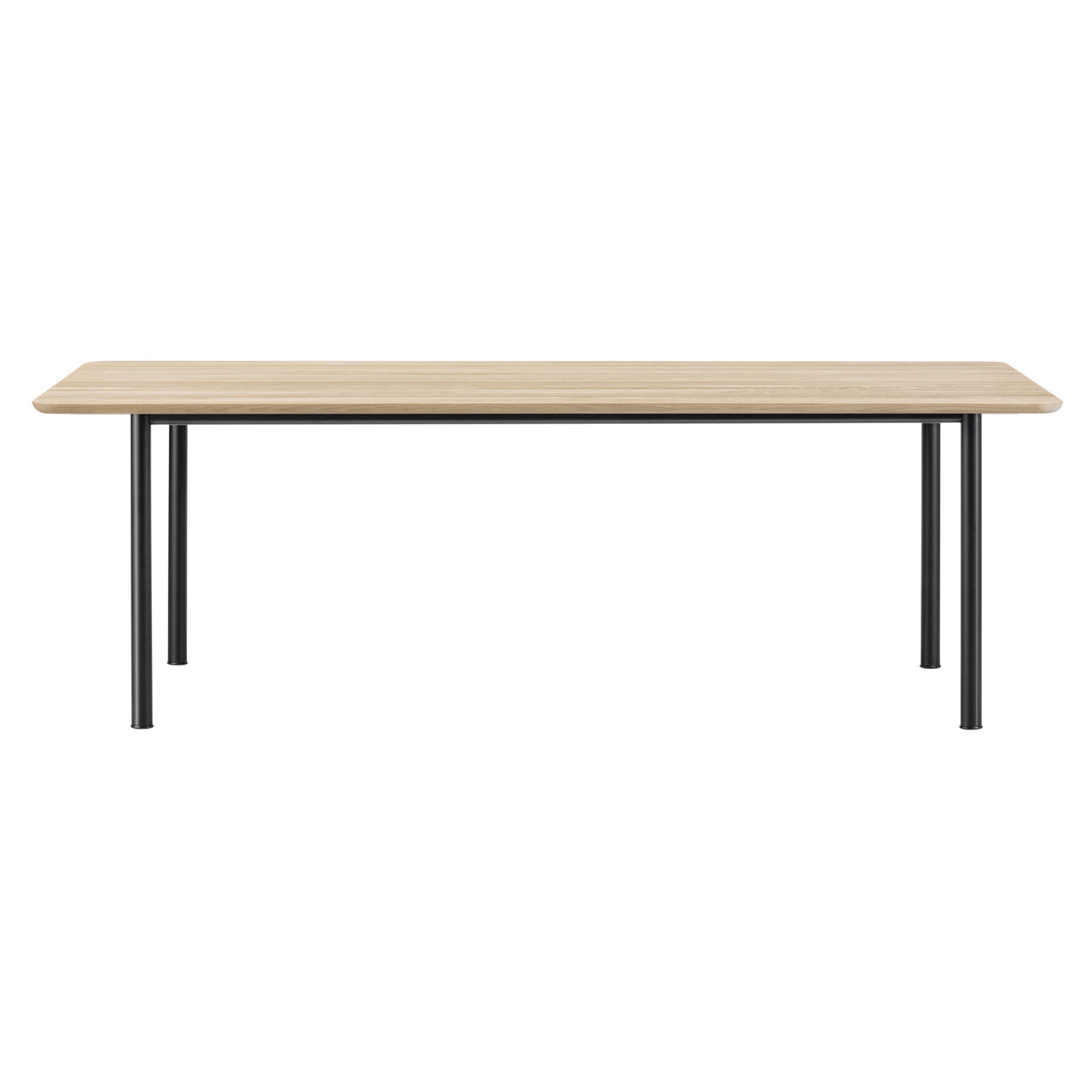 A rectangular dining table with a light oak top, rounded corners and four slim black tubular legs