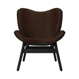 A Conversation Piece Lounge Chair: Black Oak + Brown