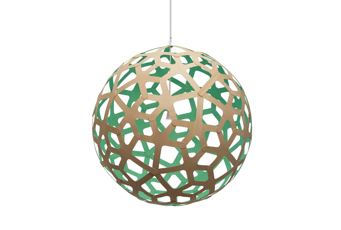 Spherical pendant light with geometric design on a white background