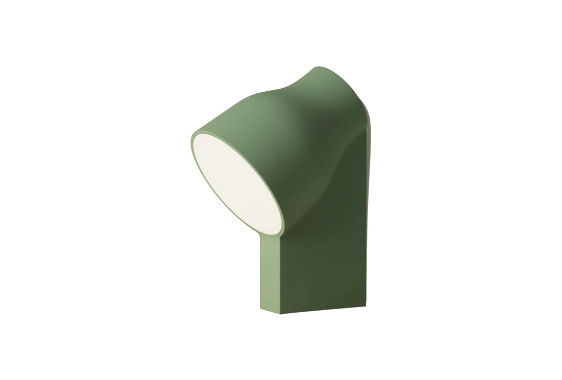 Modern green spotlight style lamp against white background