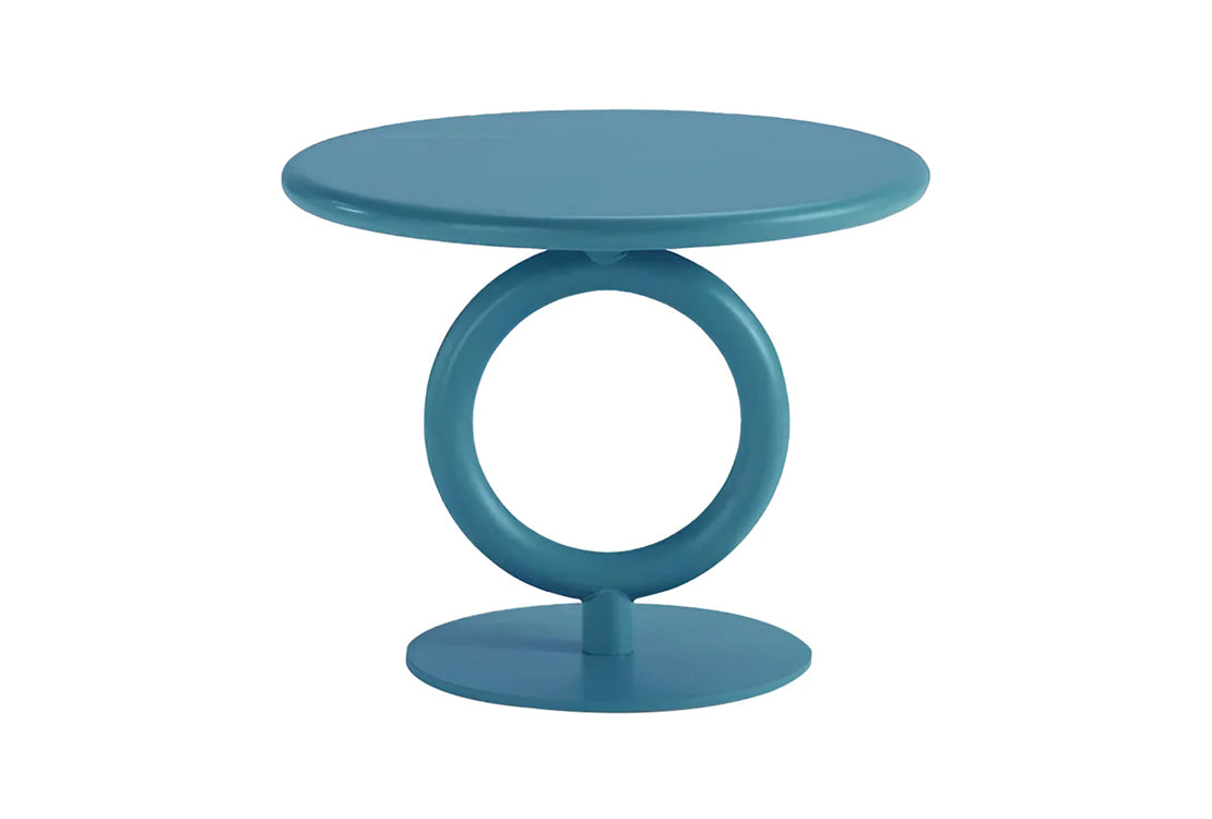 Blue round side table with unique circular design on a white background