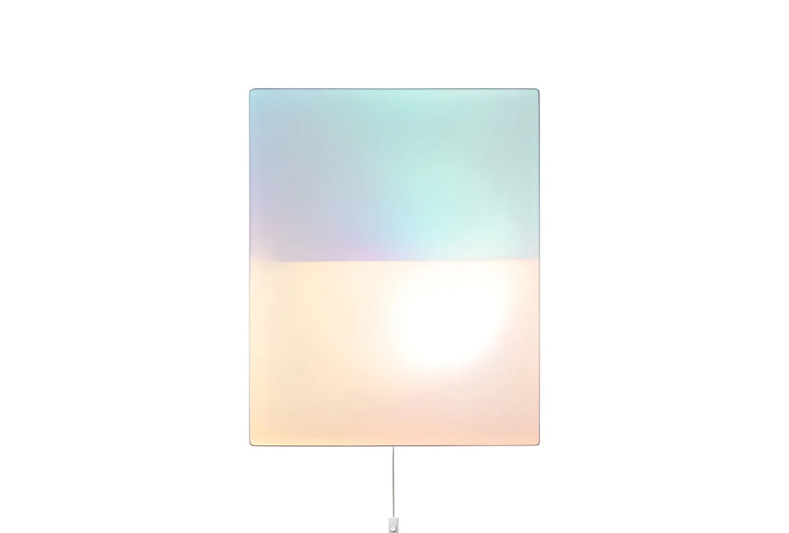 Gradient lampshade transitioning from blue to pink on a white background