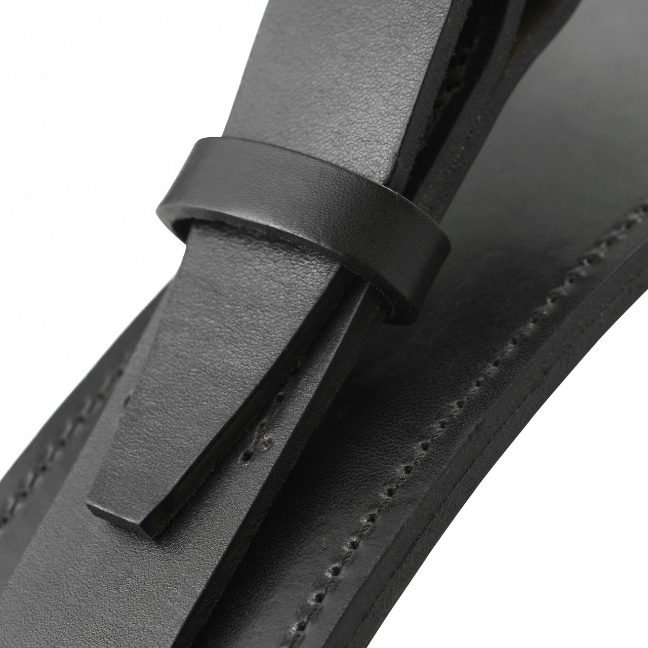 Close-up of a black leather strap with a stitched edge threaded through a small leather loop