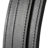 Close-up of a curved grey leather frame with three bands of black contrast stitching